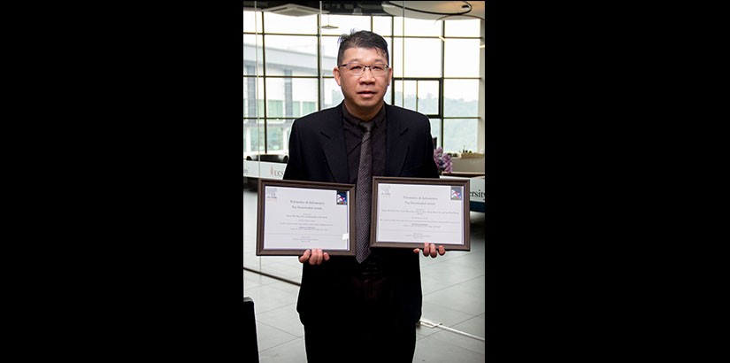Professor Ooi wins two more awards for Top Downloaded Article.