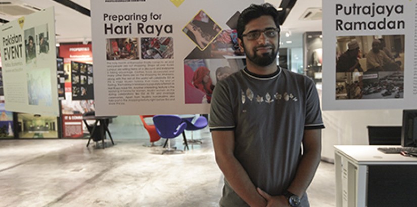  ASPIRING JOURNALIST: Muhammed Abdul Moiz with one of the photos that he had taken during the Ramadhan month.