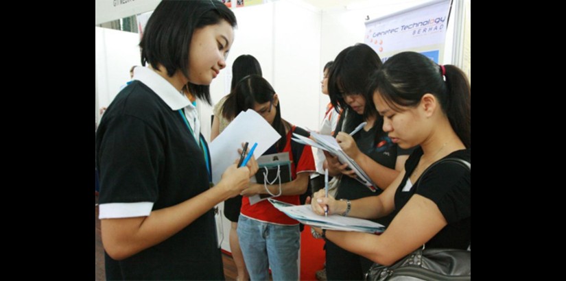  Visitors filling in job applications