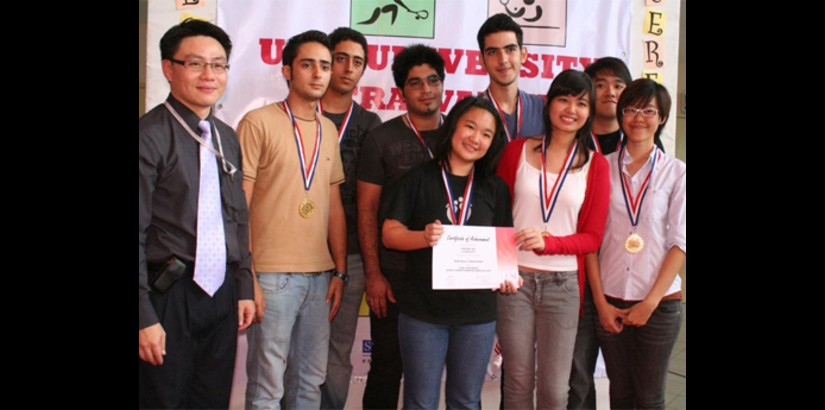 Mr. Moses Ling Wei (far left) in a group photo with the winners of the dodgeball event